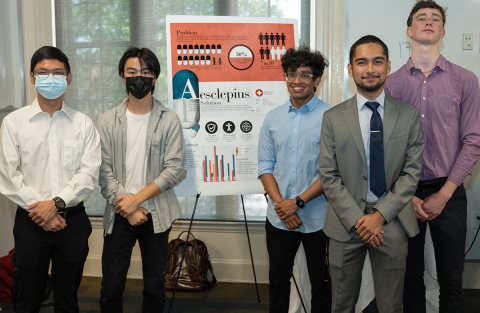 The Asclepius team during their poster presentation.