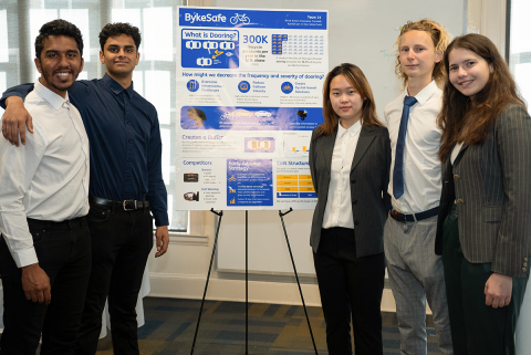The BykeSafe team during their poster presentation.