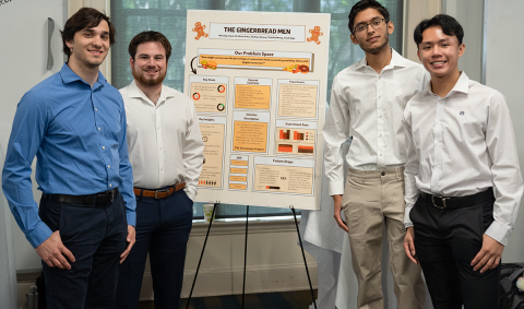 The Gingerbread Men team during their poster presentation.
