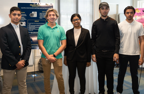 The HumiTech team during their poster presentation.