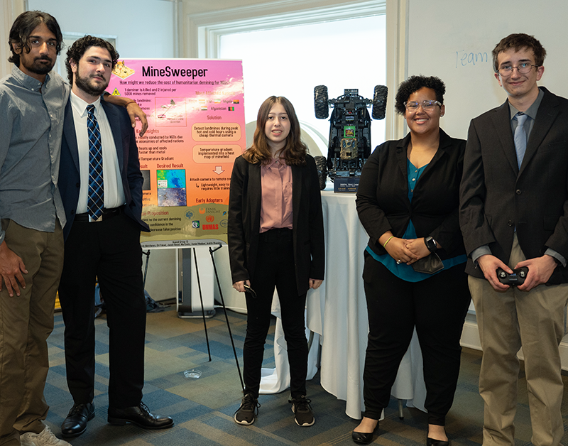 MIneSweeper LEAD Team during a poster presentation.